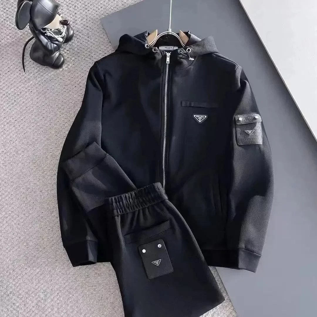 Prada Tracksuits Black zip-up hooded tracksuit with triangle logo patches — hot prada suit01