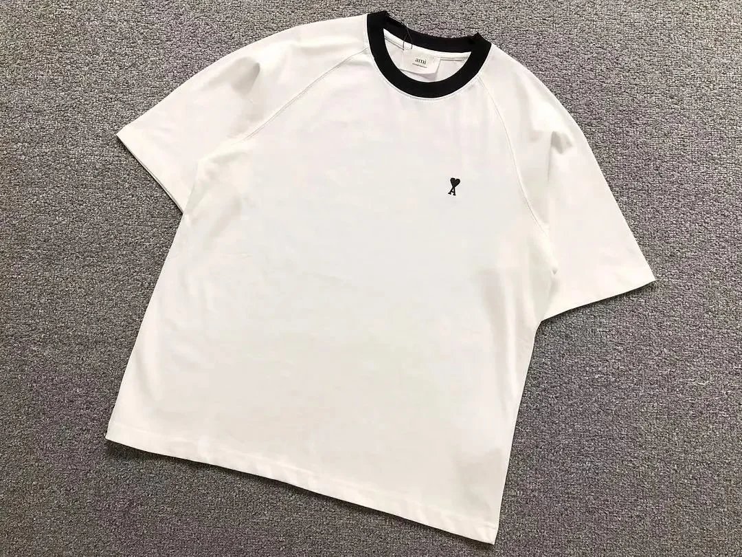 AMI Paris T-Shirts Contrast-trim crew-neck T-shirt with de Coeur chest logo — 07