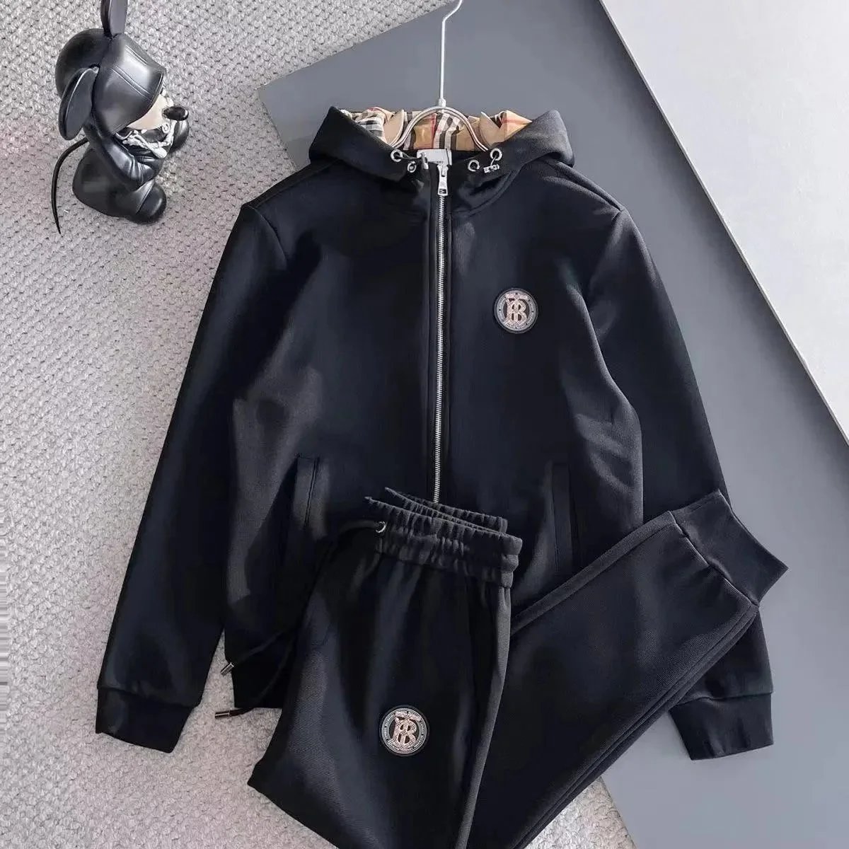 Prada Tracksuits Black zip-up hooded tracksuit with triangle logo patches — hot Burberry suit01