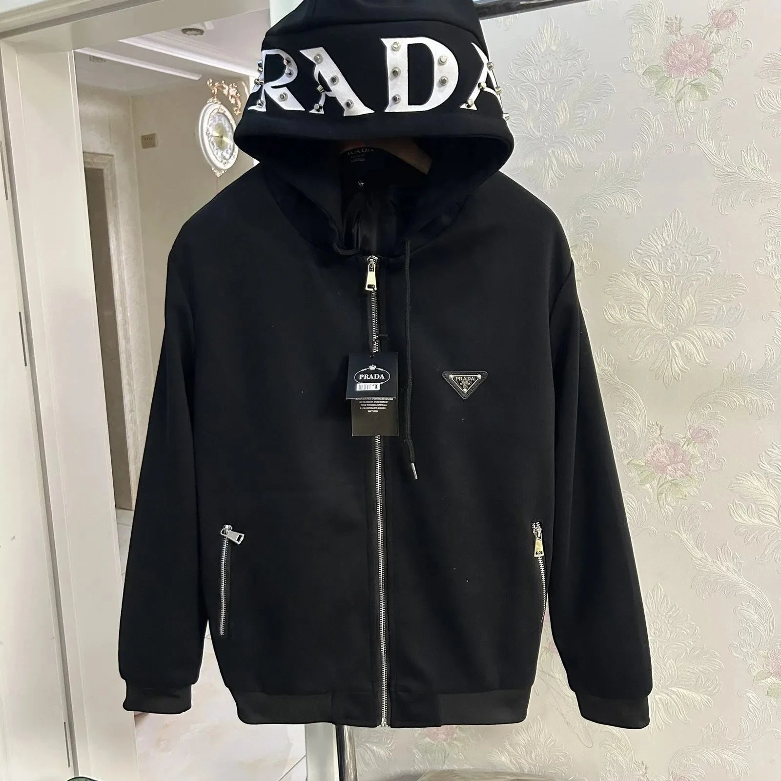 Prada Tracksuits Black zip-up hooded tracksuit with triangle logo patches — Prada1