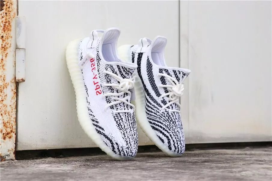 White Zebra Suggested to take a half size or one size larger.