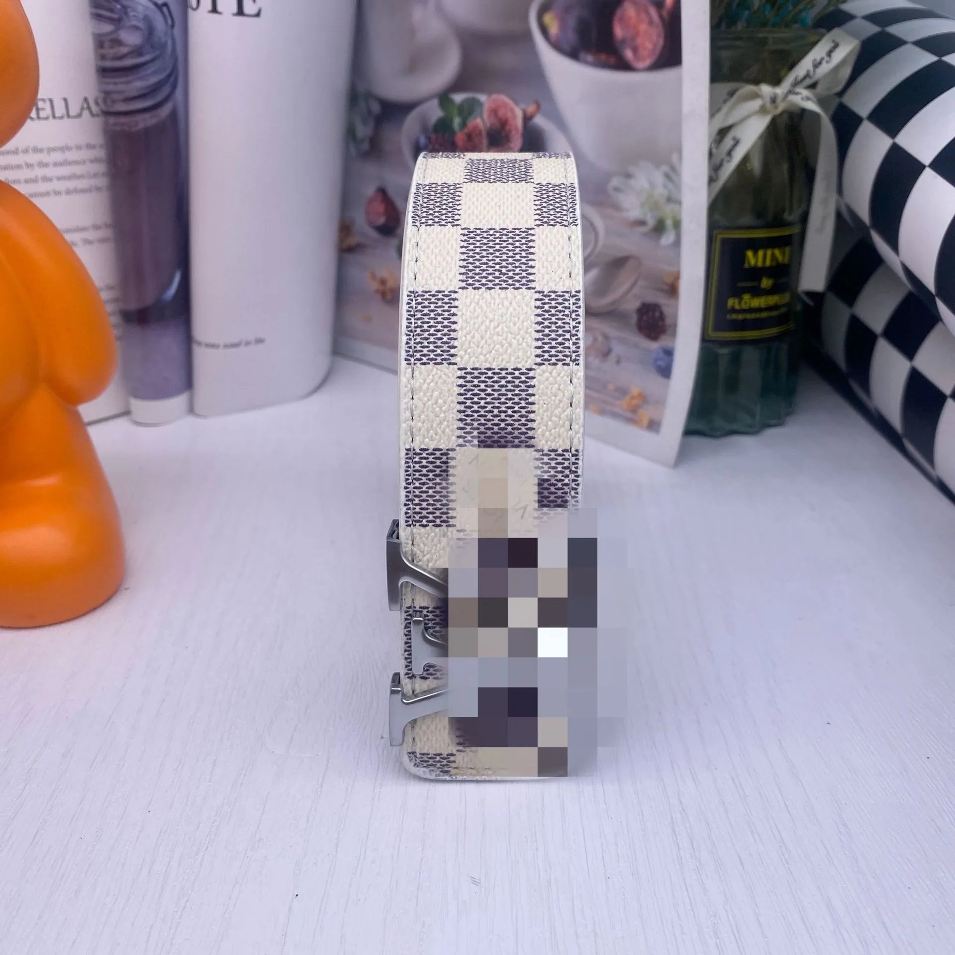 White grid silver buckle