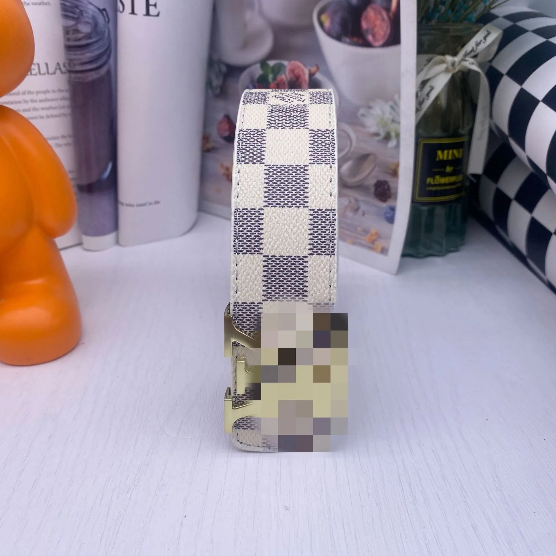 White grid gold buckle