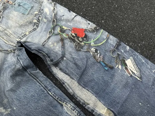 Customized Chain-Embellished Distressed Wide-Leg Jeans - 13