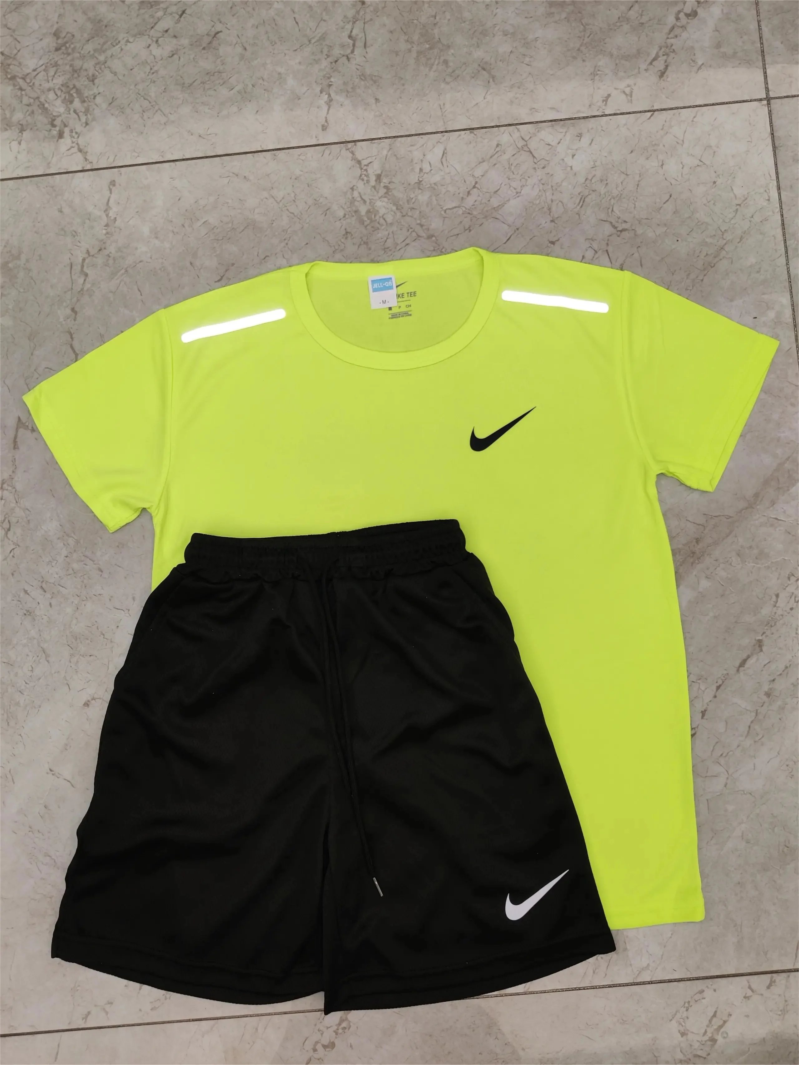 Nike Matching Sets Short-Sleeve Top and Shorts Set with Reflective Shoulder Details image 7