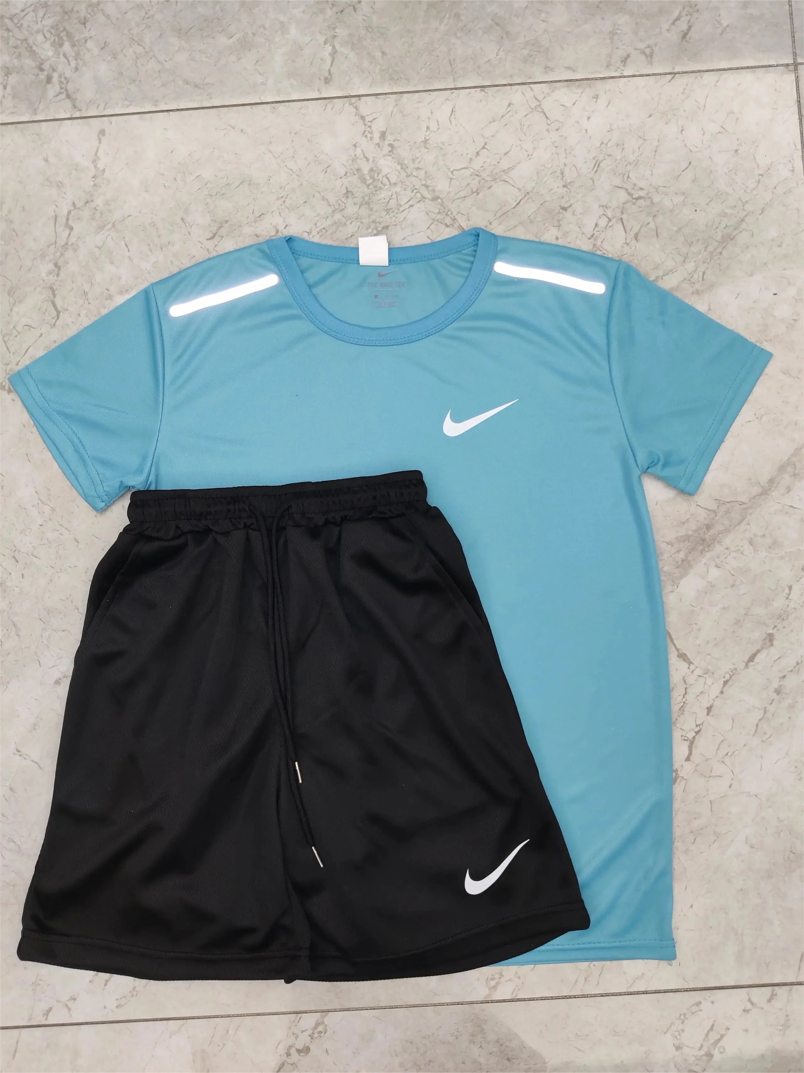 Nike Matching Sets Short-Sleeve Top and Shorts Set with Reflective Shoulder Details image 8