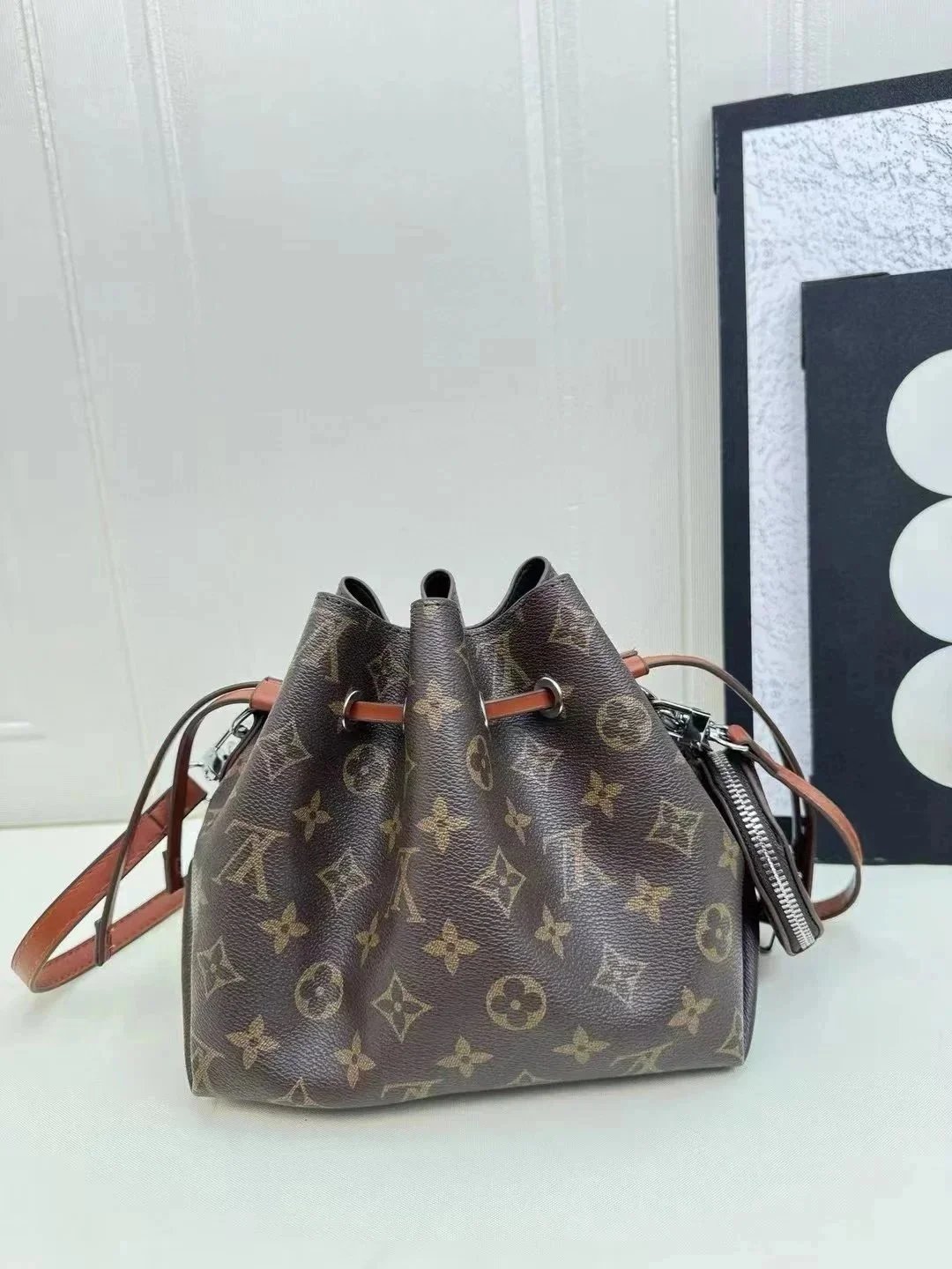 Louis Vuitton Crossbody Bags Monogram drawstring bag with braided chain strap image 4