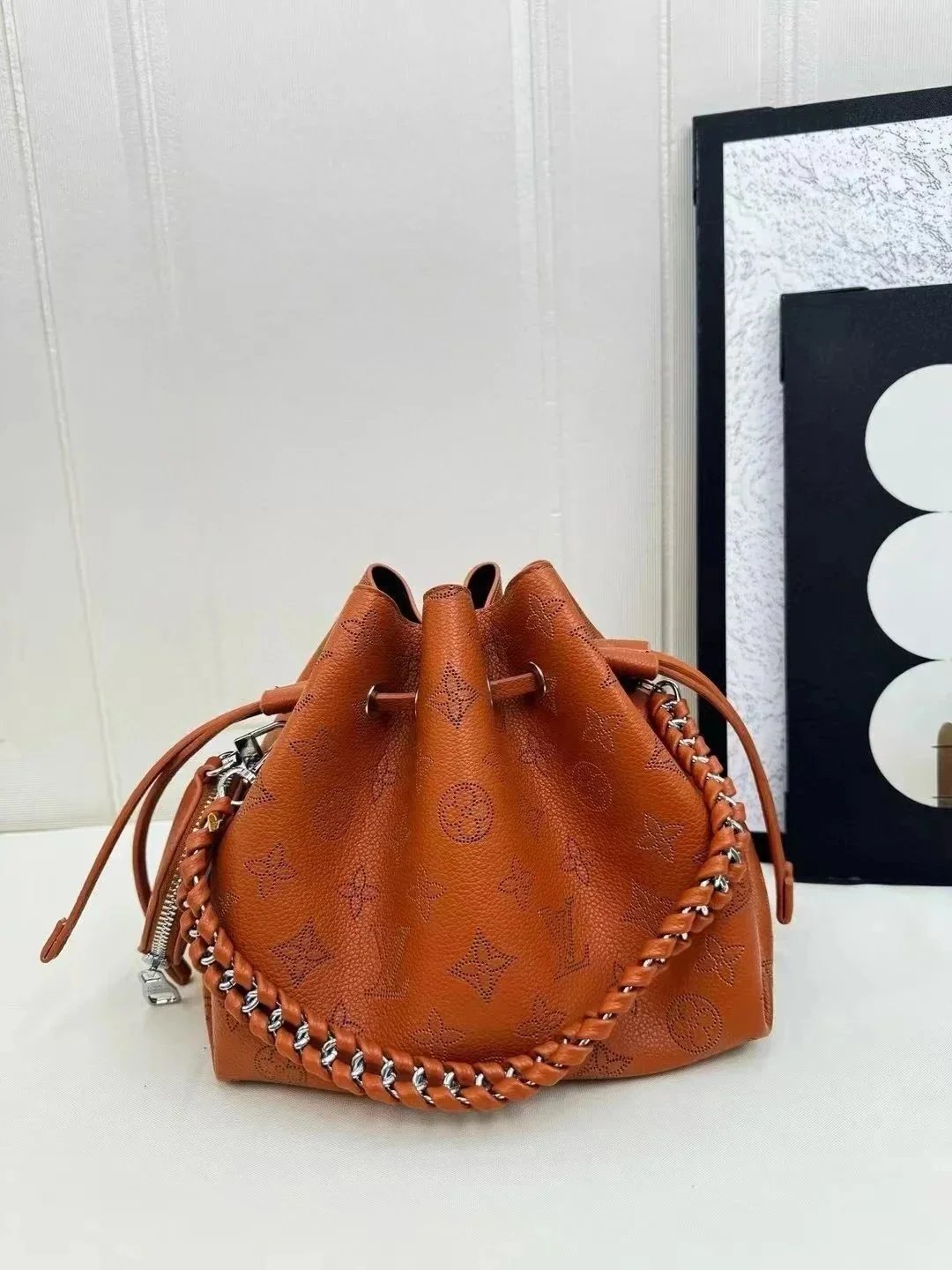 Louis Vuitton Crossbody Bags Monogram drawstring bag with braided chain strap — MT003