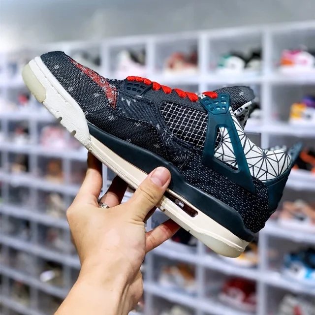 AJ4 Kaws SB Men's Black Cat Detail