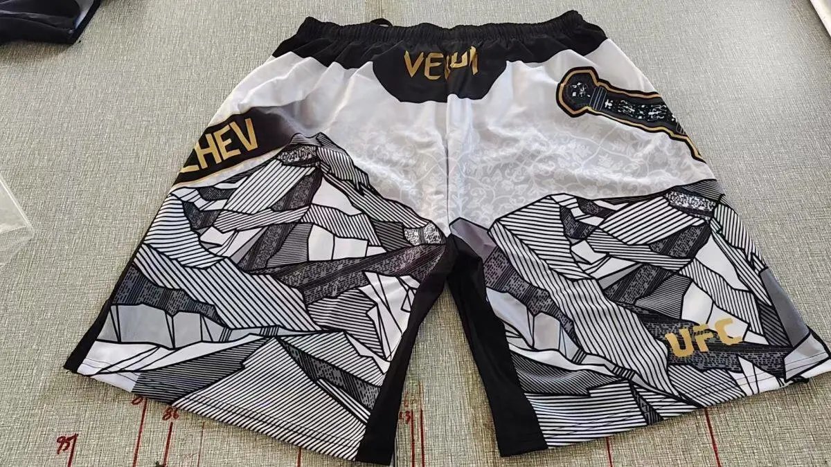 Other UFC Islam Makhachev Unrivaled Shorts White Black Gold