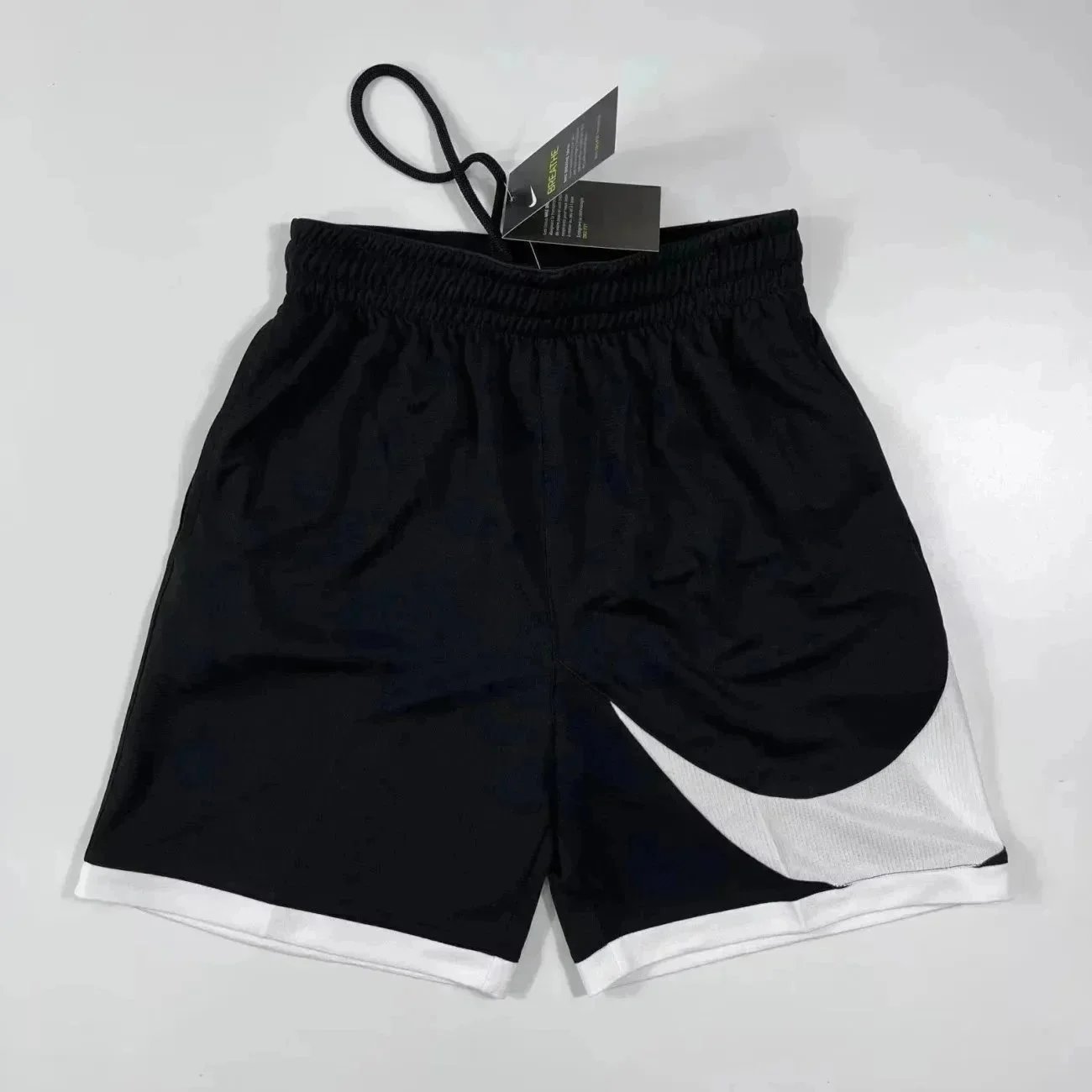 Nike Shorts Drawstring with reflective side stripes and zip pocket — 31