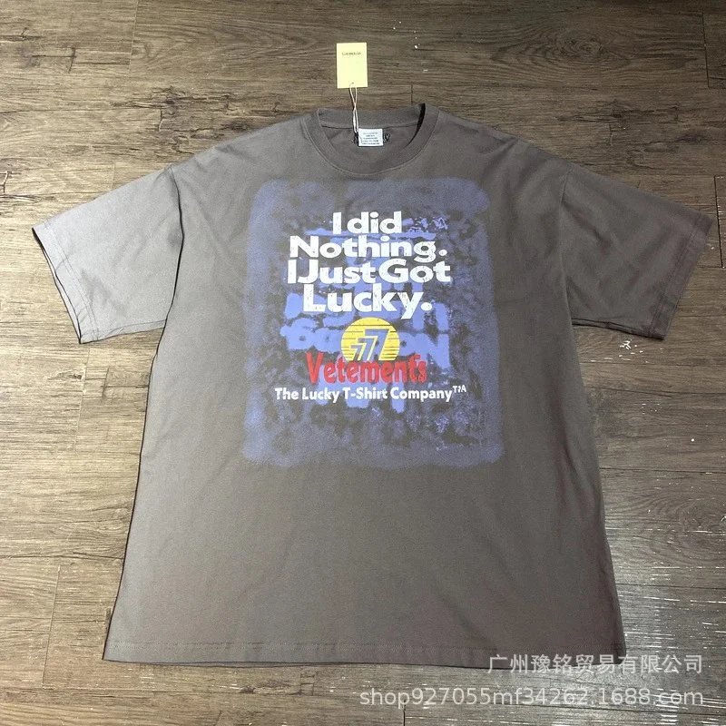 VETEMENTS T-Shirts Graphic Slogan T-Shirt — 2301 Carbon Gray
