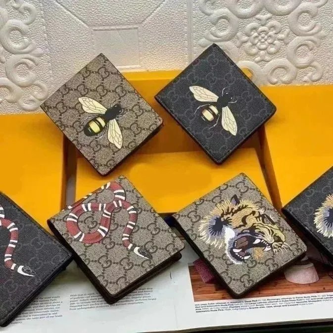 Gucci GG Supreme Wallets [33 s