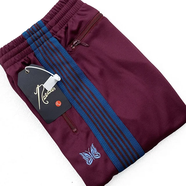 Needles Trousers Striped track pants with butterfly embroidery product detail image 26