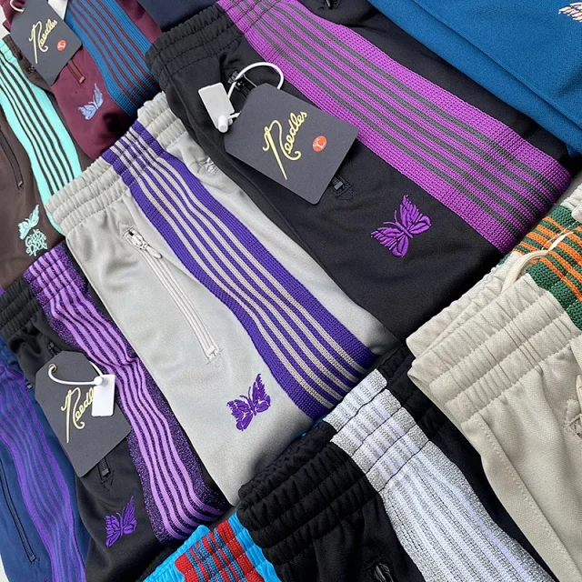 Needles Trousers Striped track pants with butterfly embroidery product detail image 11