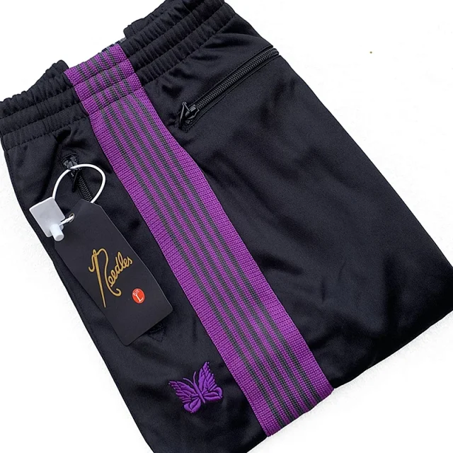 Needles Trousers Striped track pants with butterfly embroidery product detail image 29