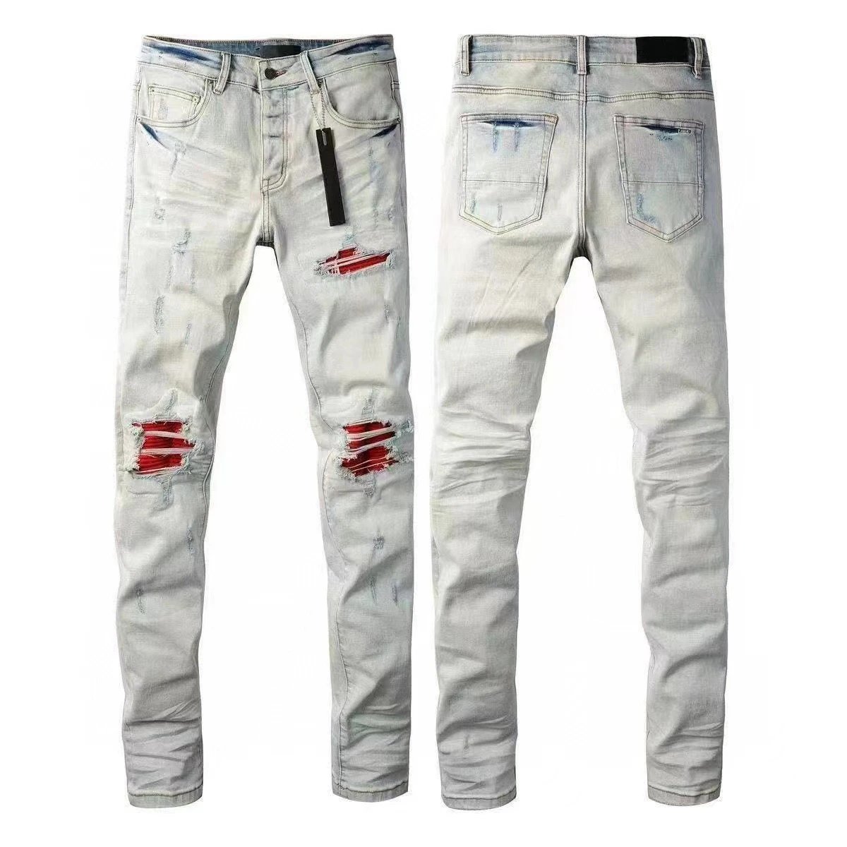 AMIRI Jeans Washed distressed embroidered — M16