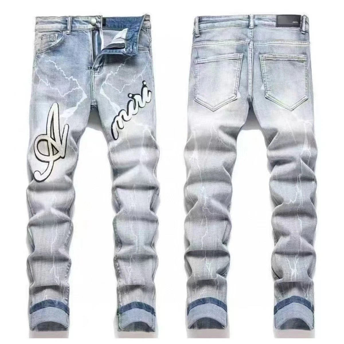 AMIRI Jeans Washed distressed embroidered — M09