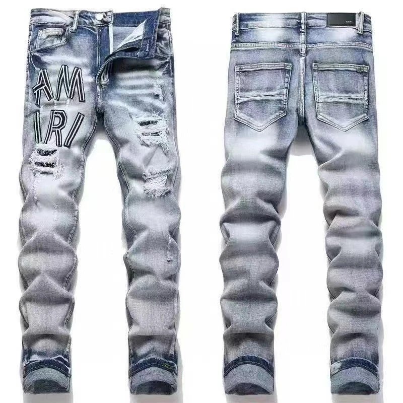 AMIRI Jeans Washed distressed embroidered — M12