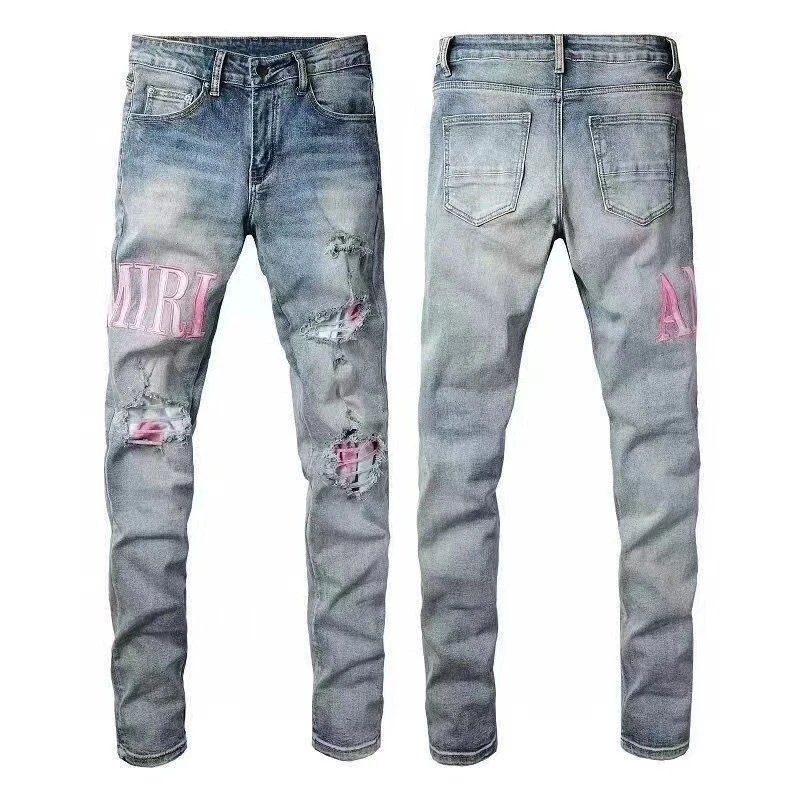 AMIRI Jeans Washed distressed embroidered — M33