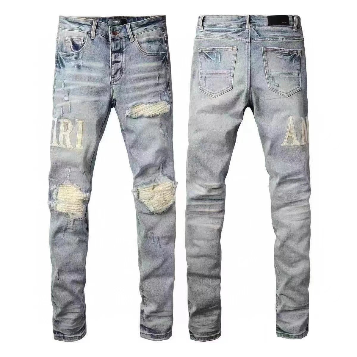 AMIRI Jeans Washed distressed embroidered — M06