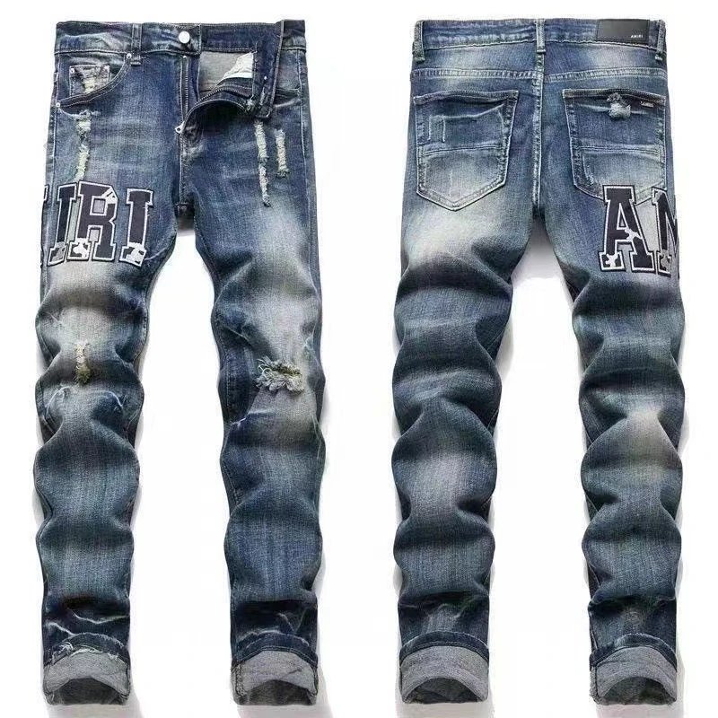 AMIRI Jeans Washed distressed embroidered — M42