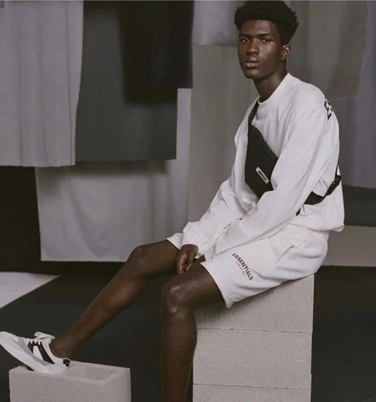 Fear of God Essentials Logo-Print Heather Gray Sweat Shorts - 17