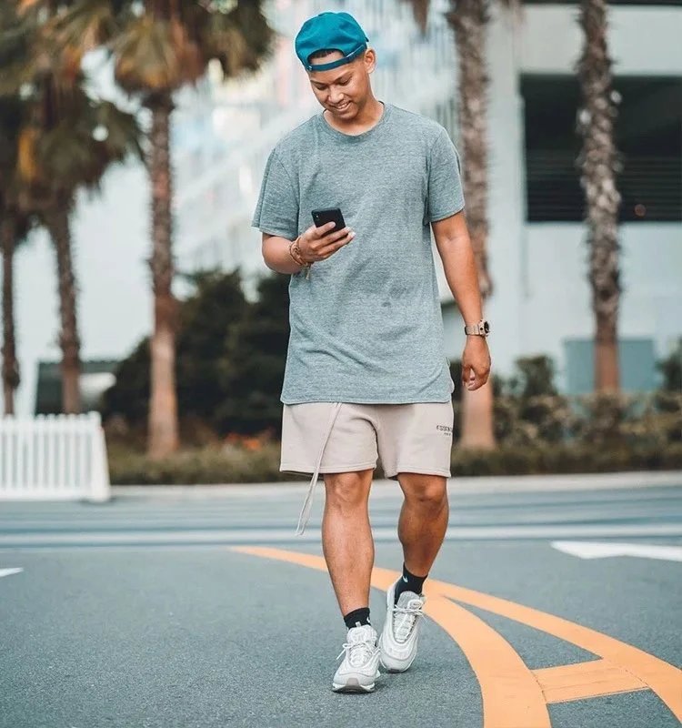 Fear of God Essentials Logo-Print Heather Gray Sweat Shorts - 16