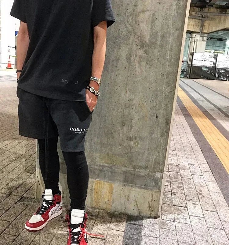 Fear of God Essentials Logo-Print Heather Gray Sweat Shorts - 18