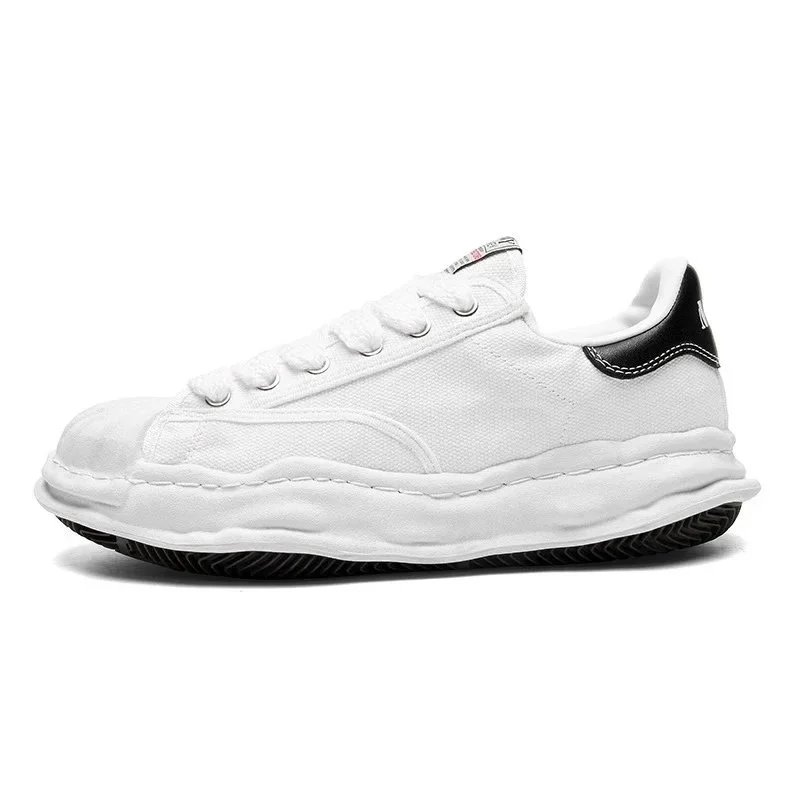Alexander McQueen Oversized Low-Top Sneakers — Multiple Colors product photo 3