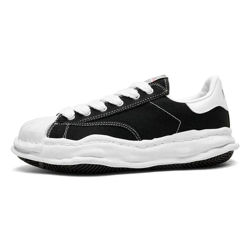 Alexander McQueen Oversized Low-Top Sneakers — Multiple Colors product photo 2
