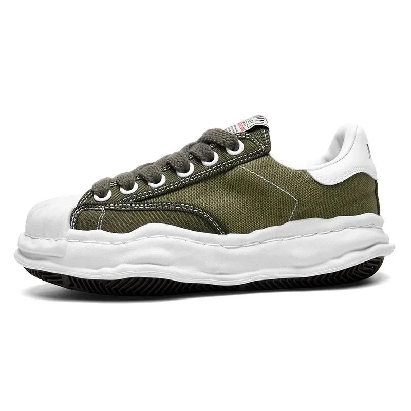 Alexander McQueen Oversized Low-Top Sneakers — Multiple Colors product photo 4