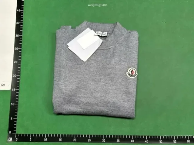Moncler Knitwear Crewneck knit sweater with logo patch product detail image 1