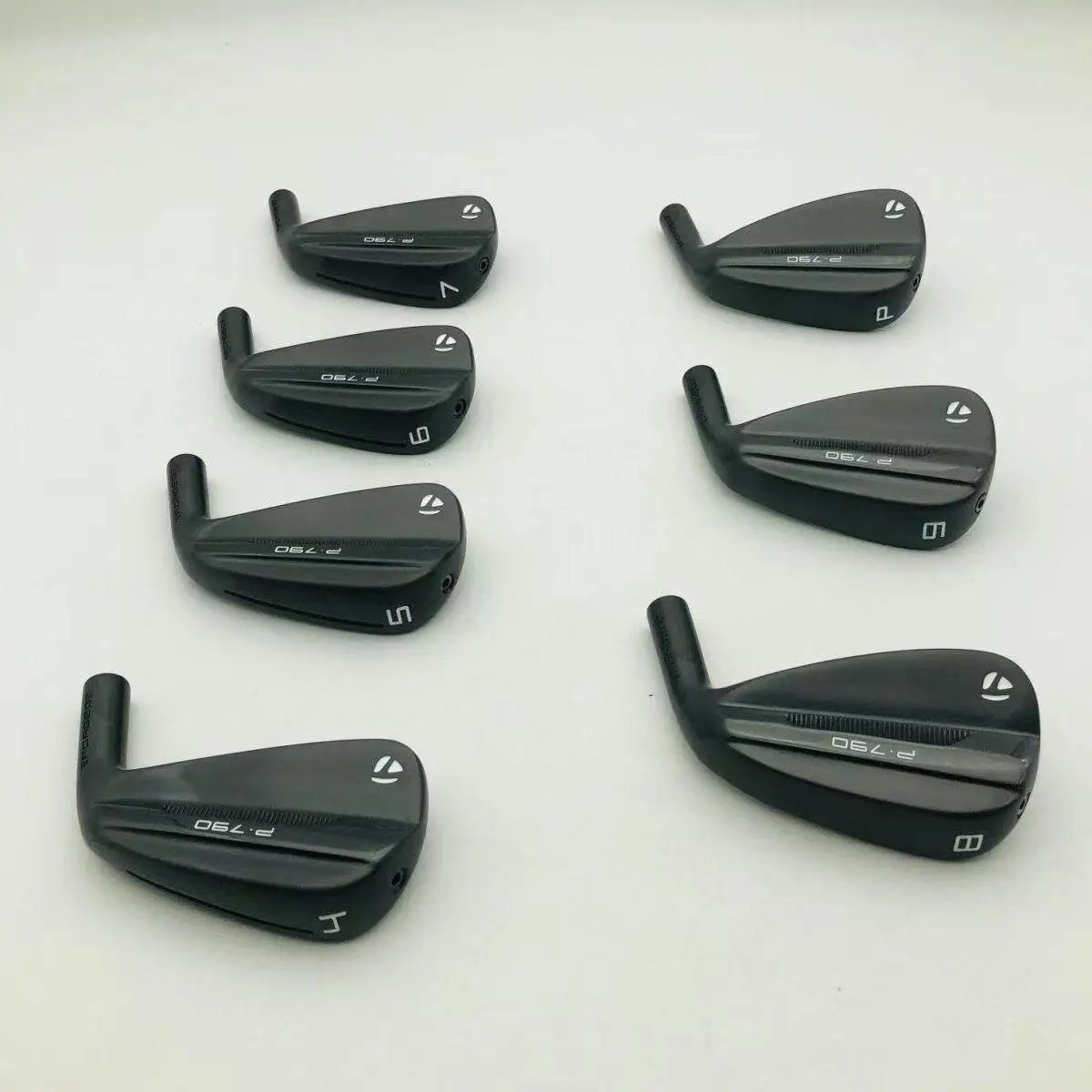 Black club heads only, 7 pieces (shafts and grips not assembled)