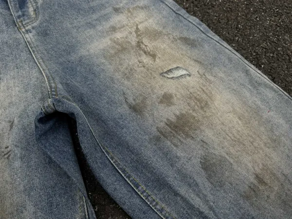 Design Wide-Leg Distressed Light Wash Jeans - 23