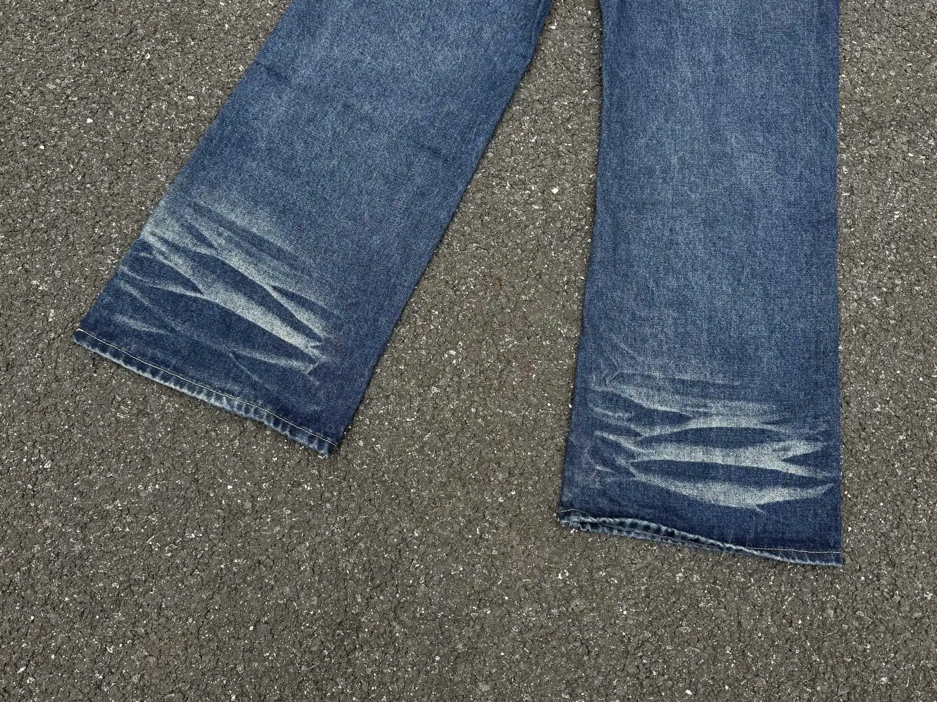 Design Wide-Leg Distressed Light Wash Jeans - 11