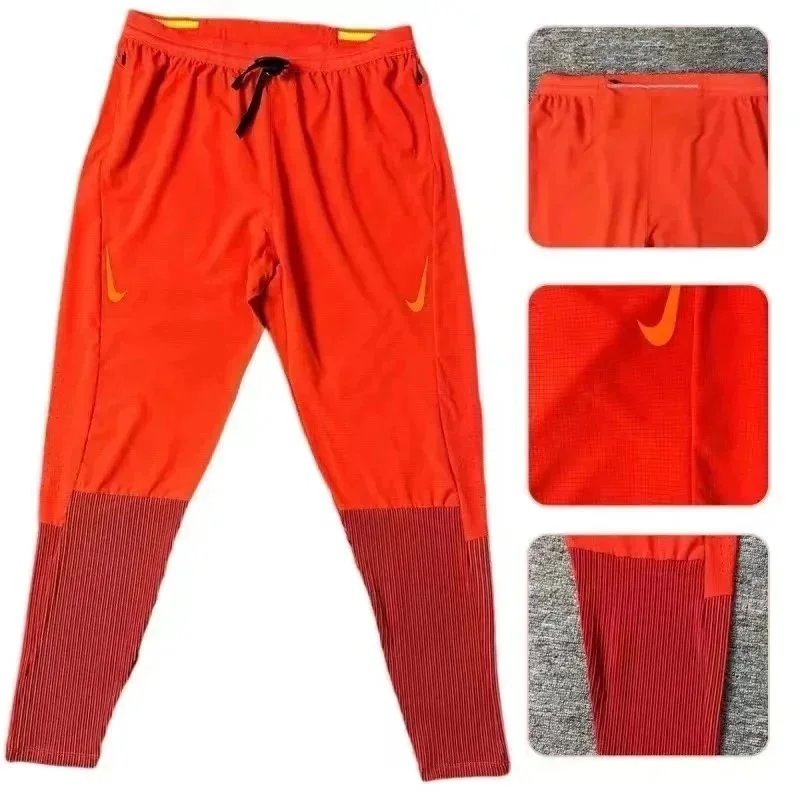Nike Trousers Tapered running with zip pockets and reflective details — 19