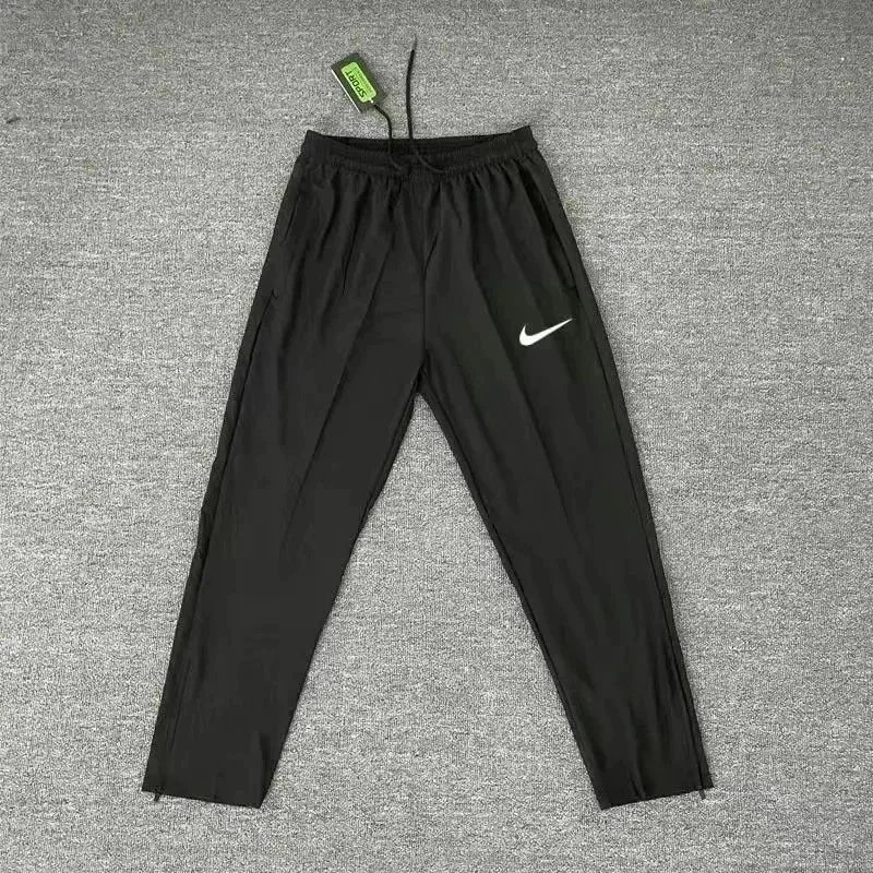 Nike Jackets Hooded zip running jacket with reflective details — Pants 1