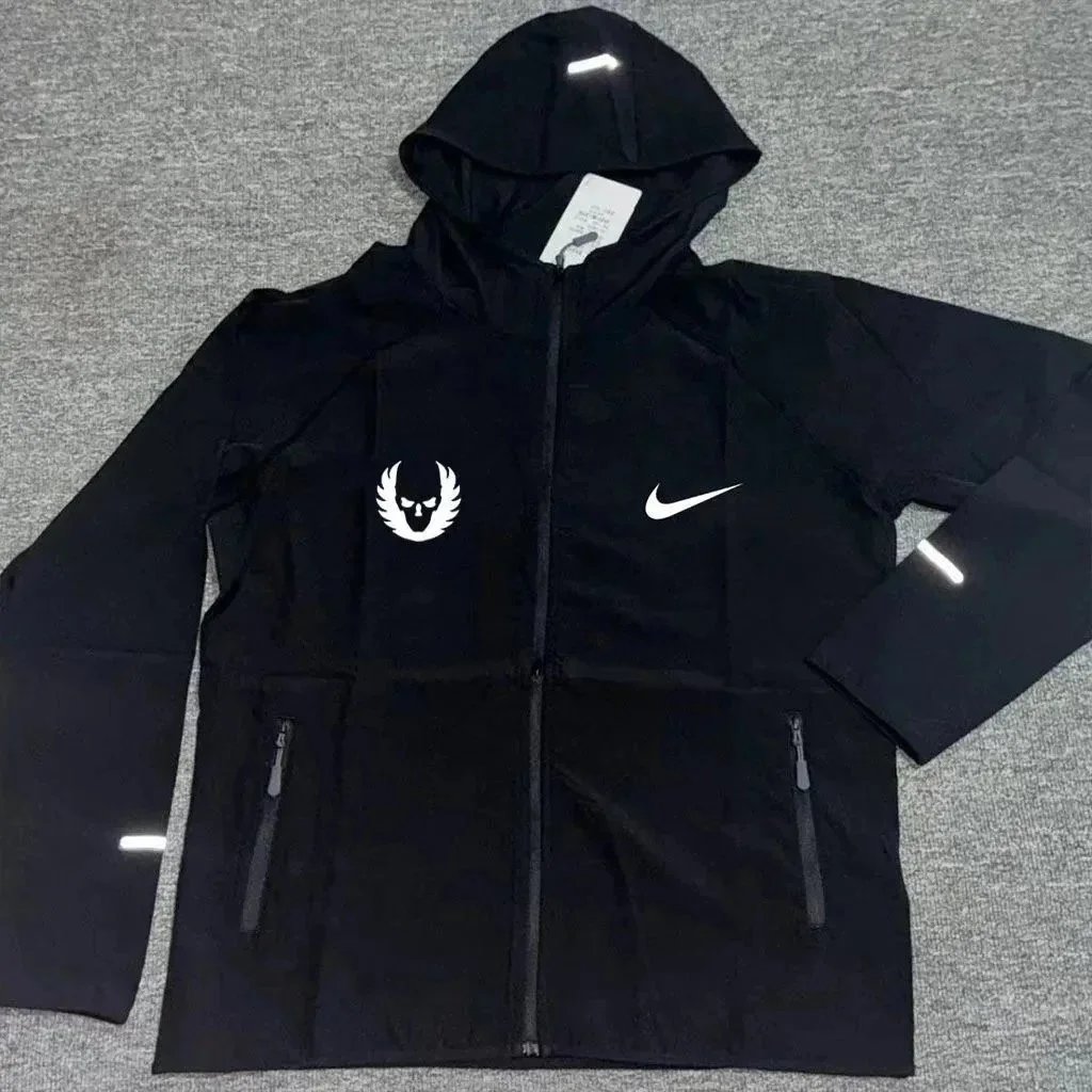 Nike Jackets Hooded zip running jacket with reflective details — 1