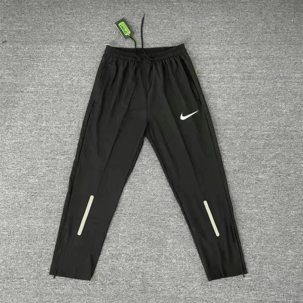 Nike Jackets Hooded zip running jacket with reflective details — Pants 2