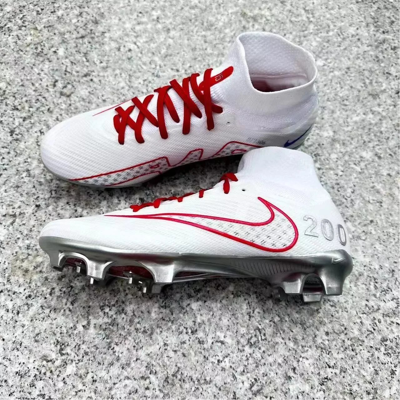 N * i * * e new assassin 15 football shoes waterproof FG nail C Ronaldo special high and low help male and female student competition training shoes