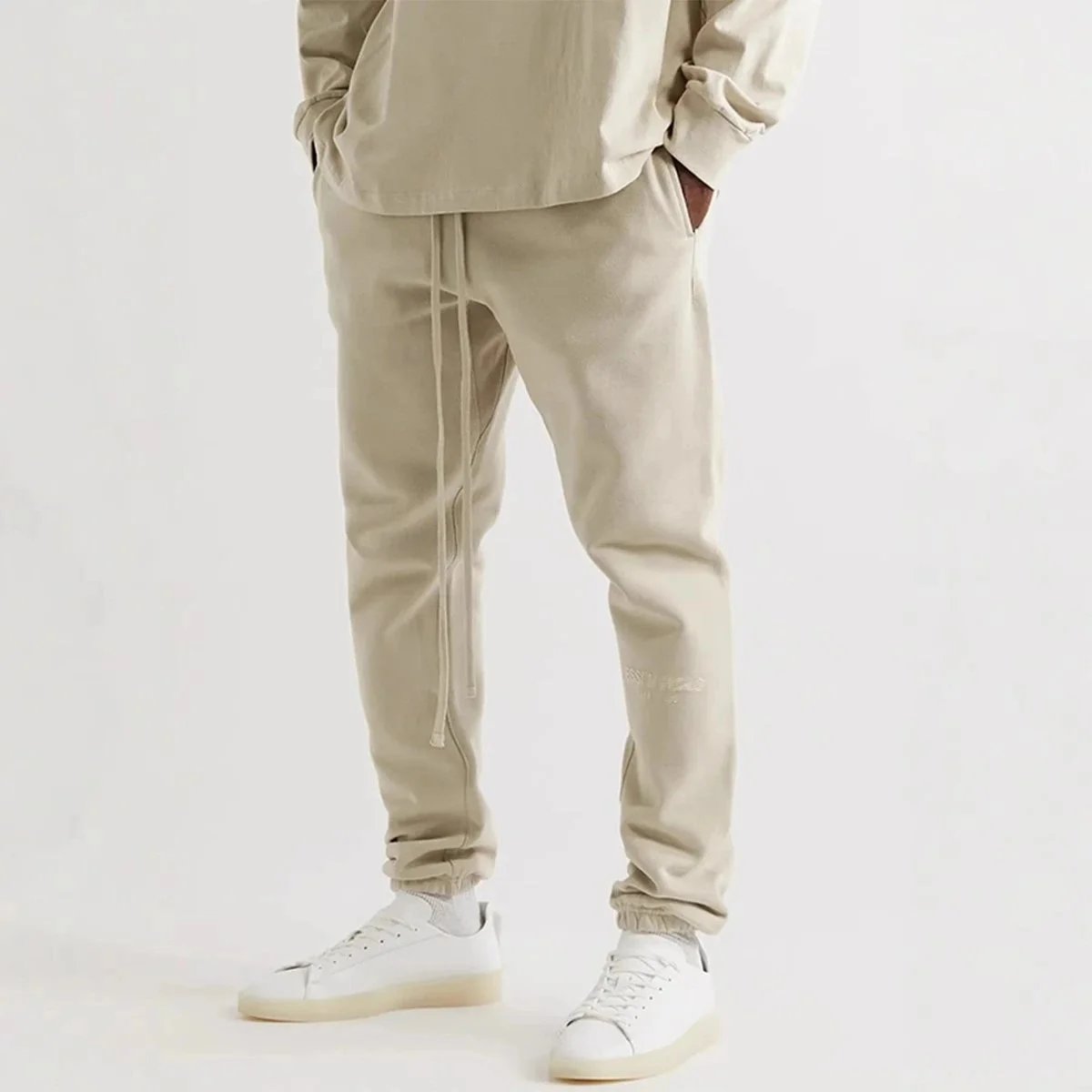 36040851919114 ESS Flocked small label bunched leg pants 3