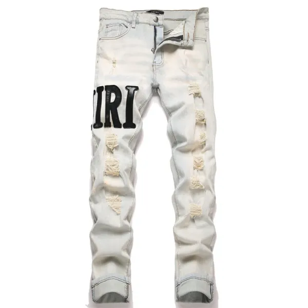 Amiri Logo Distressed Light Wash Jeans - 1