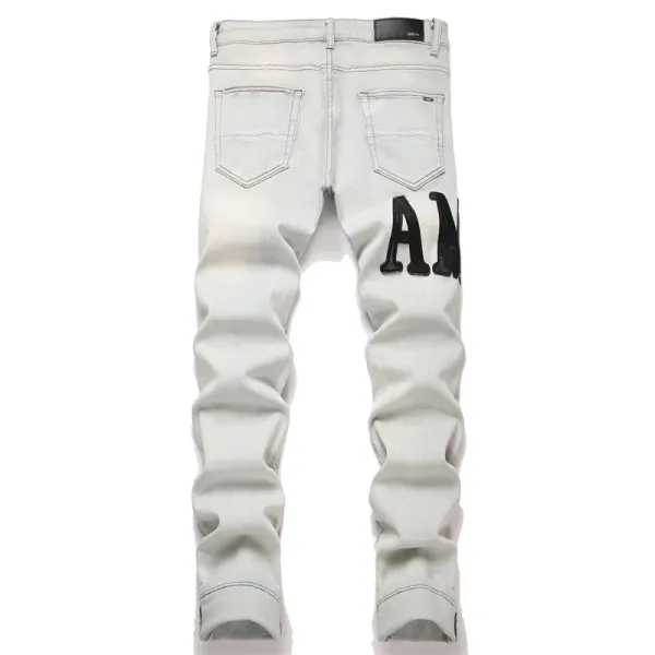 Amiri Logo Distressed Light Wash Jeans - 7