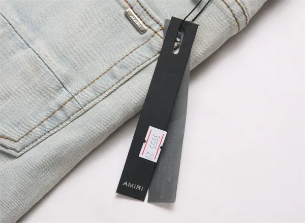 Amiri Logo Distressed Light Wash Jeans - 17