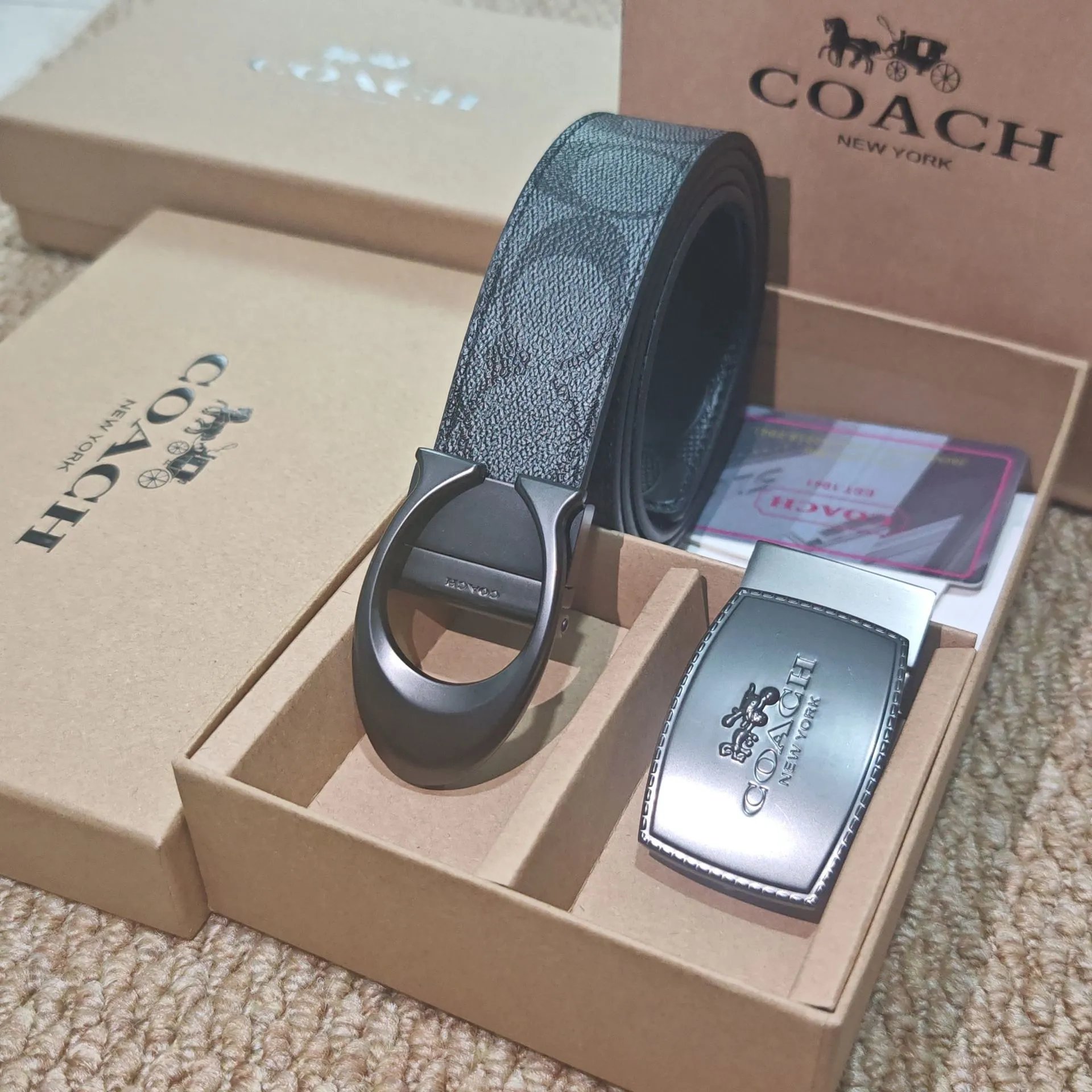 Double sided embossed C+carriage buckle