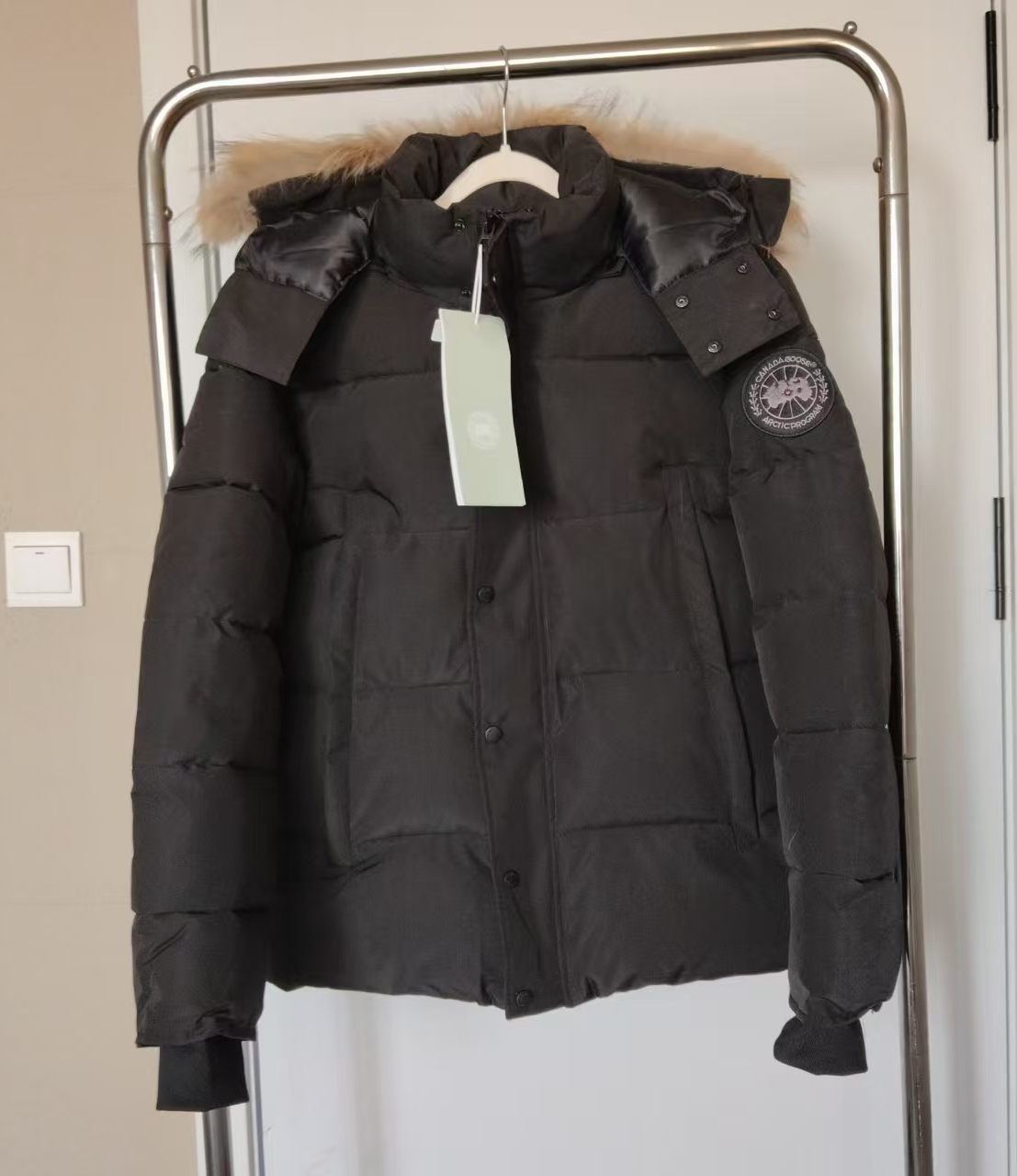 Black label with black fur collar
