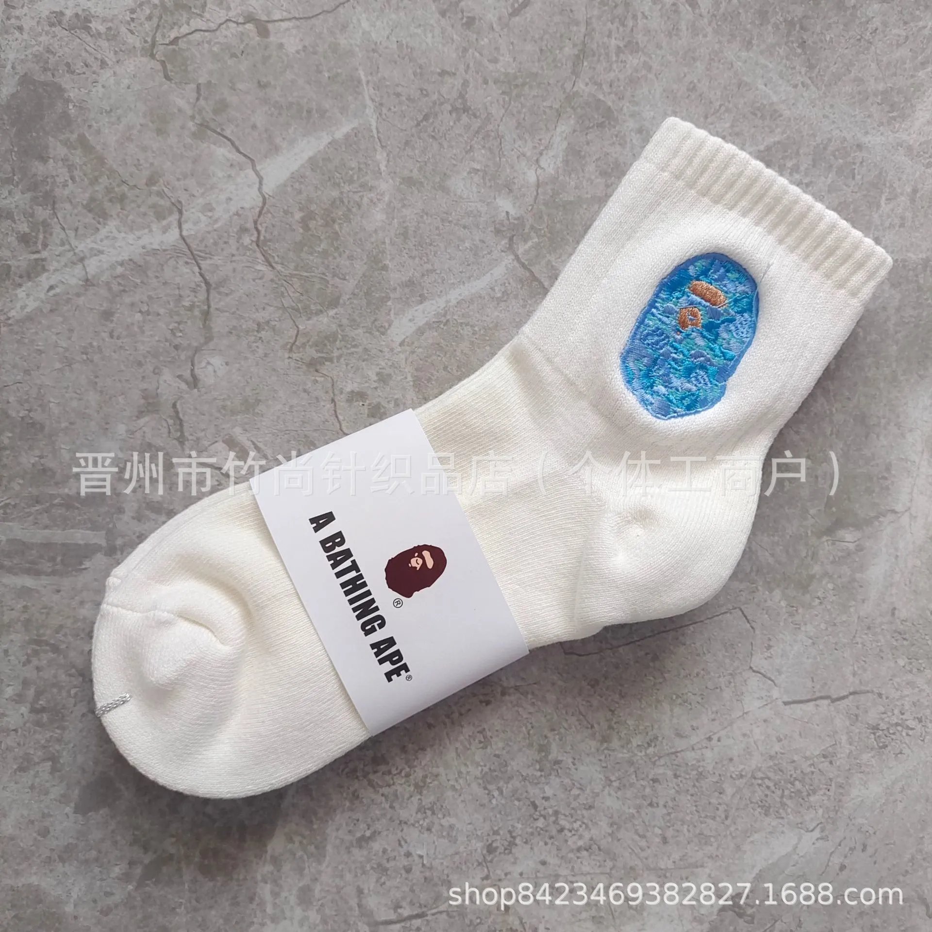 White mid-calf blue embroidery