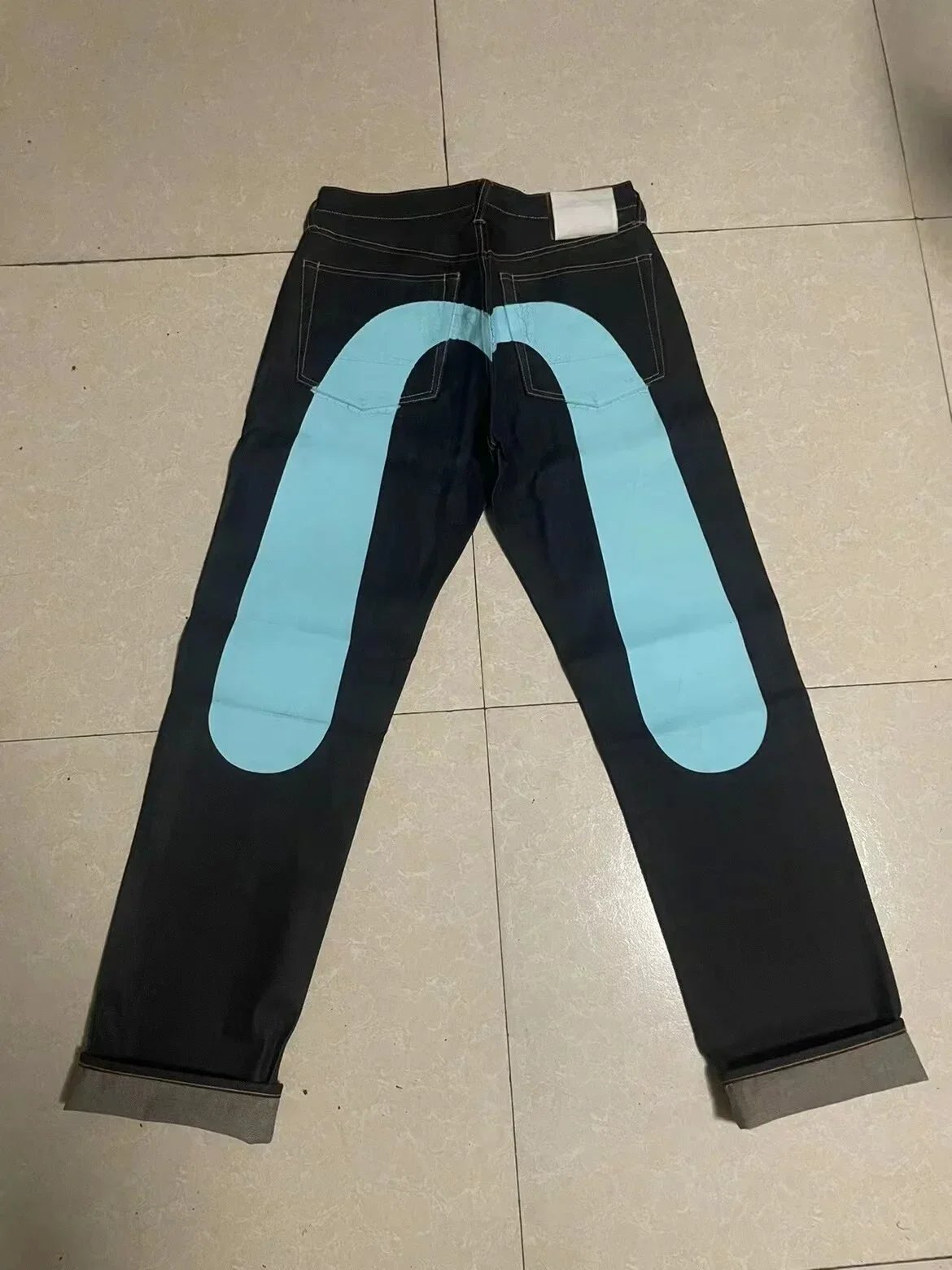 Evisu Dark Wash Jeans with Large Red Daicock Logo