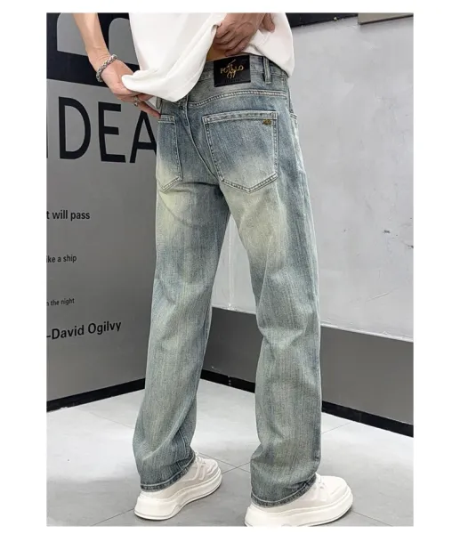 Design Wide-Leg Distressed Light Wash Jeans - 11